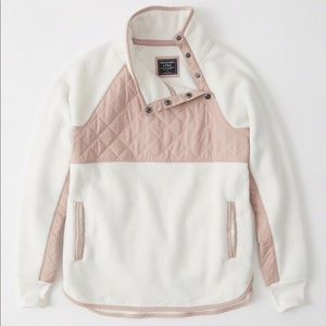 Asymmetrical snap-up fleece